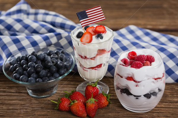 Stock photo: Fruit ice cream on wooden table