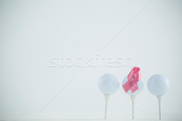 Pink Breast Cancer Awareness ribbon on golf ball Stock photo © wavebreak_media