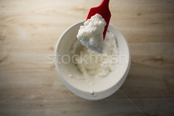 Közvetlenül lövés piros szedőlapát tejszínhab tál Stock fotó © wavebreak_media