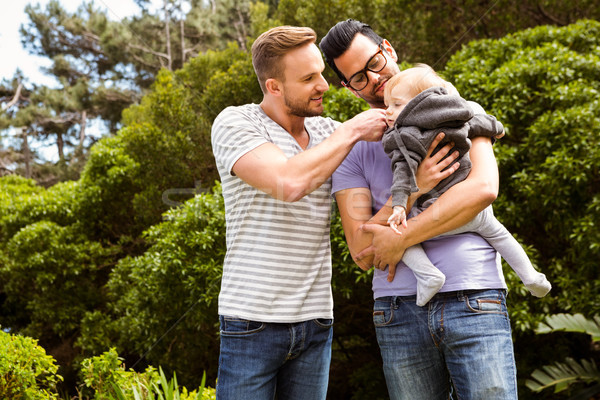 Glimlachend homo paar kind tuin man Stockfoto © wavebreak_media