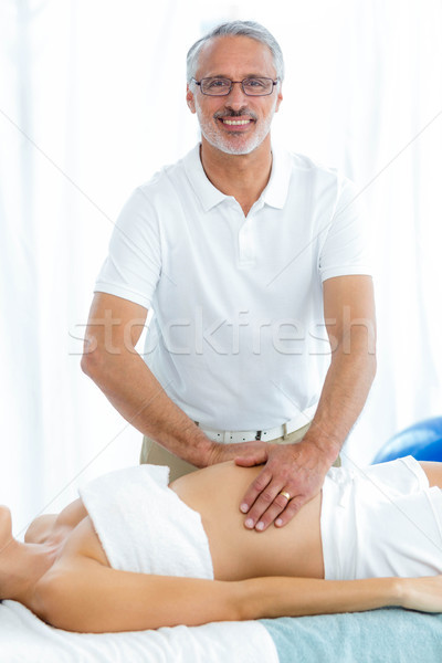 Kobieta w ciąży żołądka masażu masażysta domu ciało Zdjęcia stock © wavebreak_media