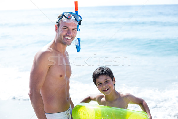 Portrait of smiling father and son at beach Stock photo © wavebreak_media