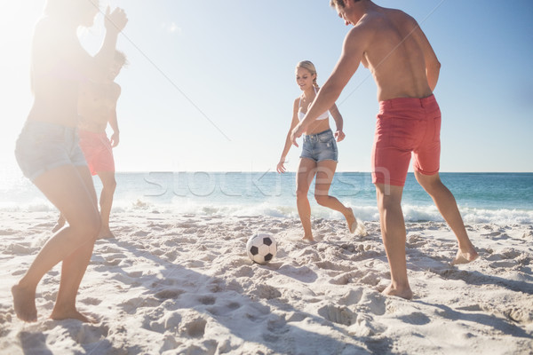 Friends playing football Stock photo © wavebreak_media