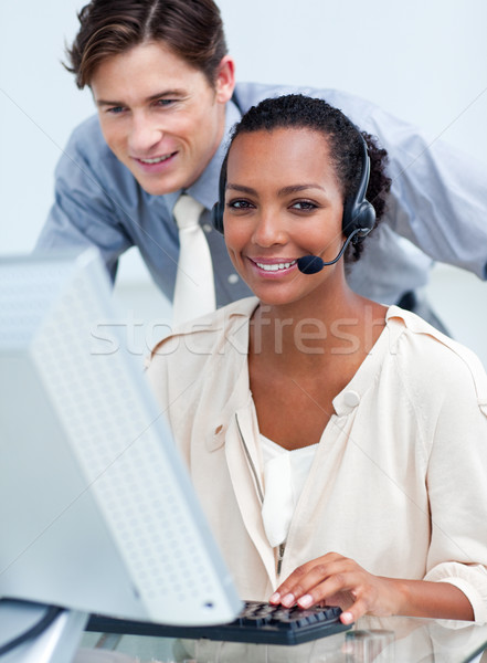 Cheerful business partners working at a computer  Stock photo © wavebreak_media