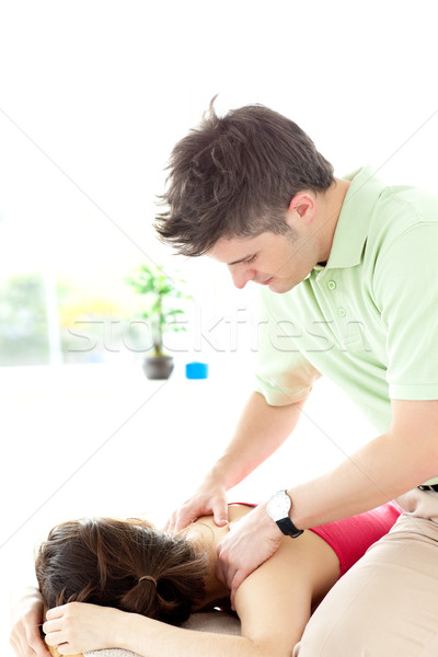 Jonge man Maakt een reservekopie massage gezondheid centrum man Stockfoto © wavebreak_media