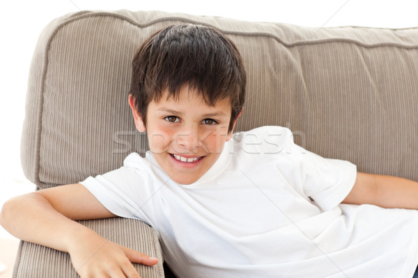 Portrait of an adorable child relaxing on the sofa Stock photo © wavebreak_media
