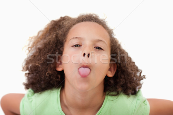 Sevimli kız dışarı dil beyaz yüz Stok fotoğraf © wavebreak_media