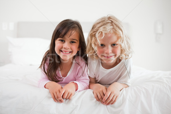 子供 ベッド ホーム 女の子 楽しい 笑い ストックフォト © wavebreak_media