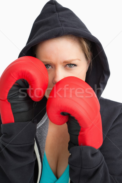 Pretty woman boxing against white background Stock photo © wavebreak_media