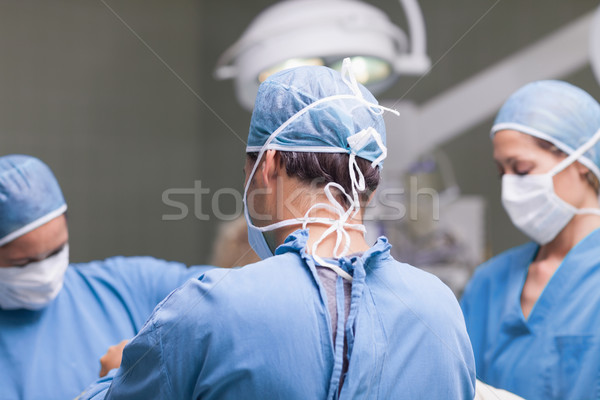 Médicaux équipe travail théâtre femme hôpital [[stock_photo]] © wavebreak_media