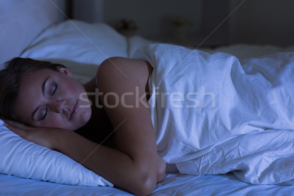 Woman sleeping at night Stock photo © wavebreak_media