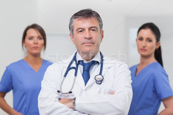 Doctor and his team of nurses Stock photo © wavebreak_media