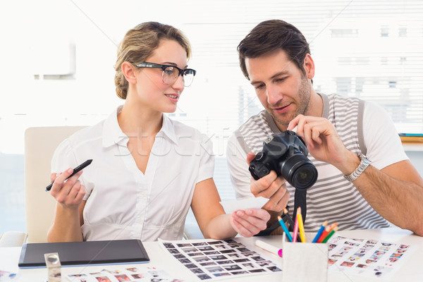 Photo editors looking at camera Stock photo © wavebreak_media