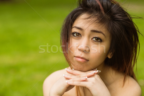 Portrait of beautiful woman in park Stock photo © wavebreak_media