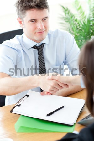 Happy businessman working at his desk Stock photo © wavebreak_media