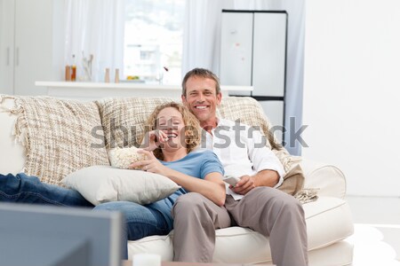 Couple drinking champagne with their dog in front of them Stock photo © wavebreak_media