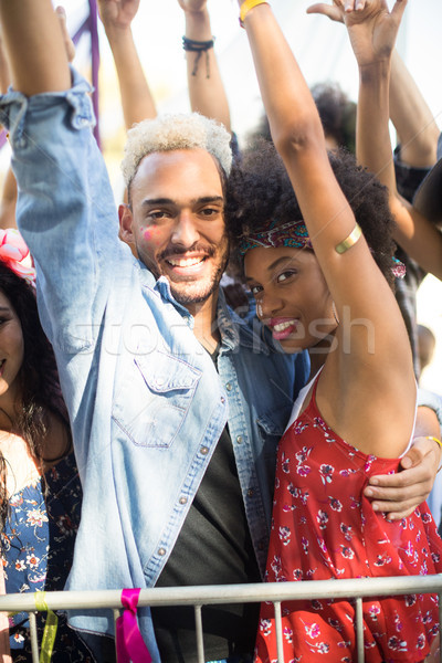 Stock photo: Portrait of young friends enjoying during music festival