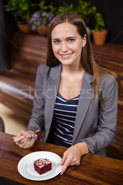 Woman eating a cake Stock photo © wavebreak_media