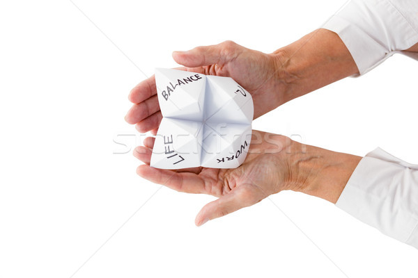 Person holding origami fortune teller Stock photo © wavebreak_media