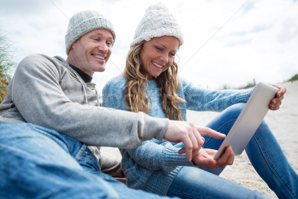 Smiling couple using digital tablet Stock photo © wavebreak_media