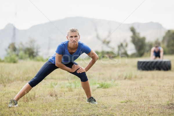 Fit woman exercising in boot camp on a sunny day Stock photo © wavebreak_media