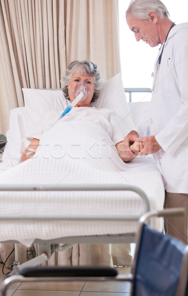 Senior doctor with his sick patient Stock photo © wavebreak_media