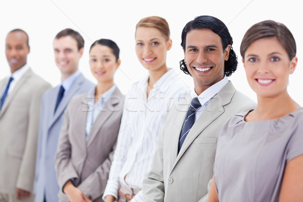 Close-up of smiling business people with focus on the second man against white background Stock photo © wavebreak_media