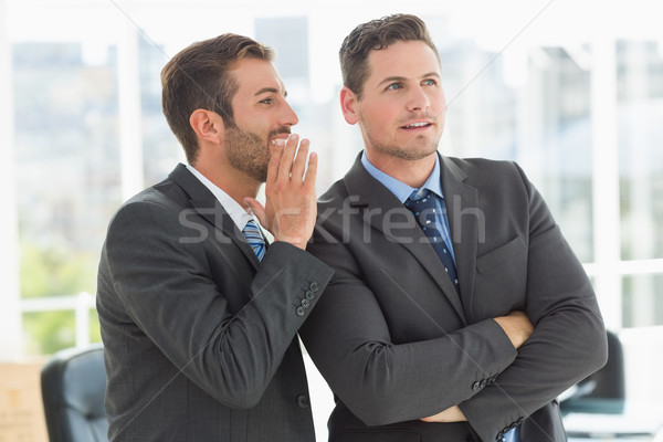 Stock photo: Young well dressed businessmen in discussion