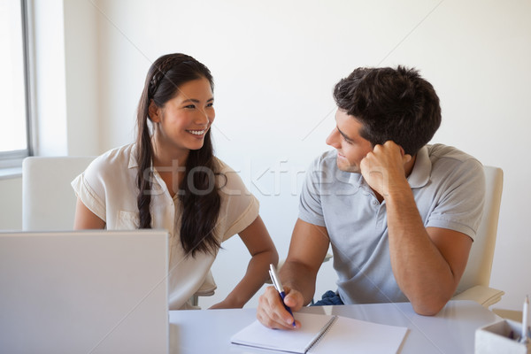 Casual business team working together at desk Stock photo © wavebreak_media