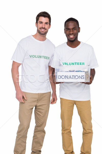 Portrait of smiling men participating at charity  Stock photo © wavebreak_media