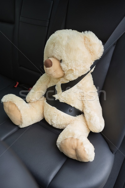 Teddy bear strapped in with seat belt  Stock photo © wavebreak_media