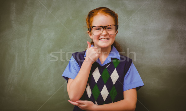 Stock photo: Portrait of cute little girl gesturing thumbs up