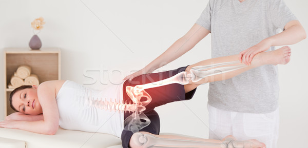 Highlighted bones of woman at physiotherapist  Stock photo © wavebreak_media
