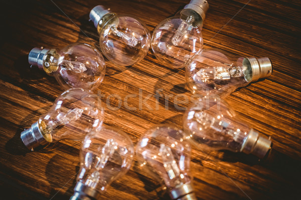 Ampoules cadre table en bois texture bois bureau [[stock_photo]] © wavebreak_media