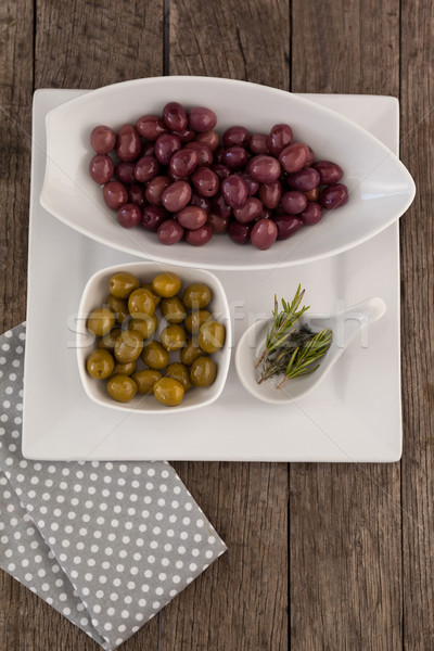 Brun vert olives romarin plaque vue [[stock_photo]] © wavebreak_media