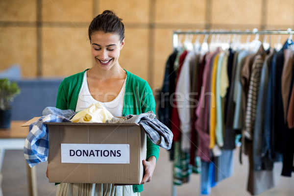 Donación cuadro oficina mujer ropa Foto stock © wavebreak_media