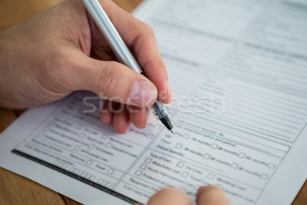Businesswoman filling last will and testament form Stock photo © wavebreak_media