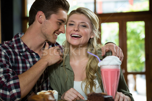 Stock photo: Romantic couple spending quality time in coffee shop