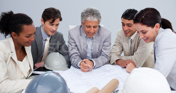 [[stock_photo]]: Ingénieurs · réunion · étudier · plans · groupe · femme