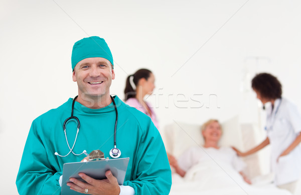 Orvosi csoport öt ember néz kamera kórház Stock fotó © wavebreak_media