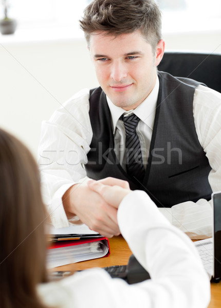 бизнесмен рукопожатием клиентов бизнеса улыбка человека Сток-фото © wavebreak_media