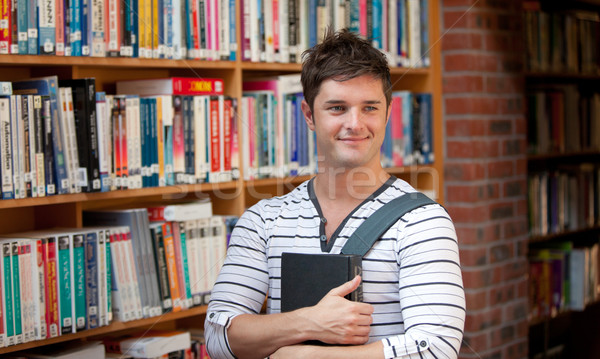 Anziehend Mann halten Buch Buchhandlung Studenten Stock foto © wavebreak_media