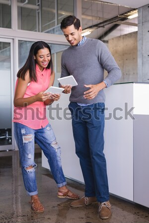 Portrait of handsome students standing up in a corridor Stock photo © wavebreak_media