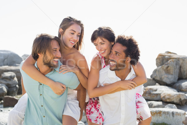 Gorgeous friends smiling at each other Stock photo © wavebreak_media