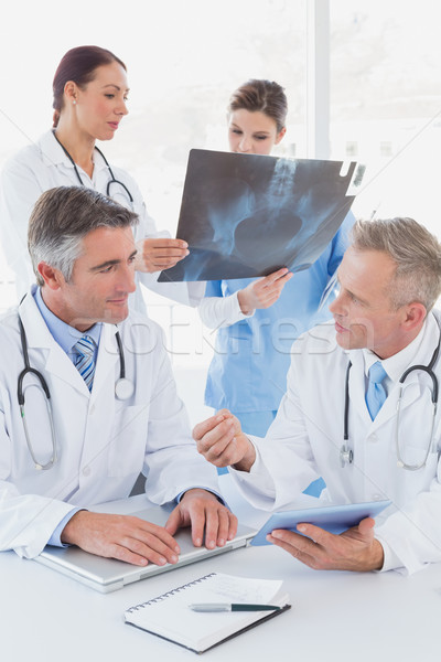 Doctor holding up an x-ray Stock photo © wavebreak_media