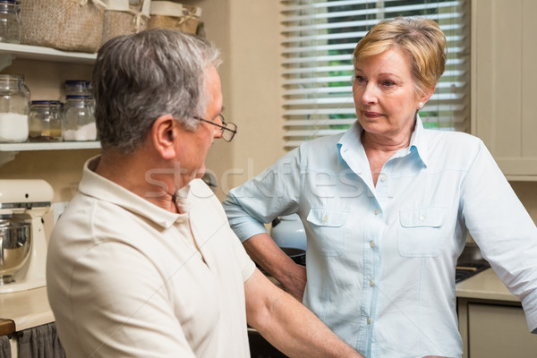 Couple de personnes âgées argument maison cuisine femme maison [[stock_photo]] © wavebreak_media