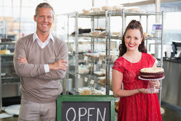 Stock photo: Cafe owners smiling at the camera