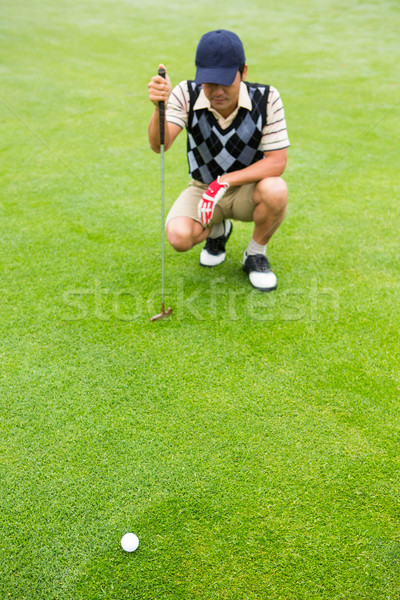 Golfista guardando palla nubi sport Foto d'archivio © wavebreak_media