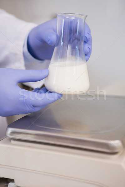 Bilimsel beyaz sıvı deney şişesi laboratuvar teknoloji Stok fotoğraf © wavebreak_media