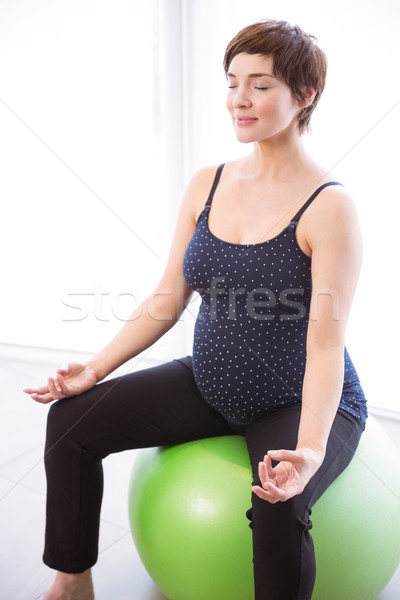 Zwangere vrouw vorm home huis fitness zwangere Stockfoto © wavebreak_media